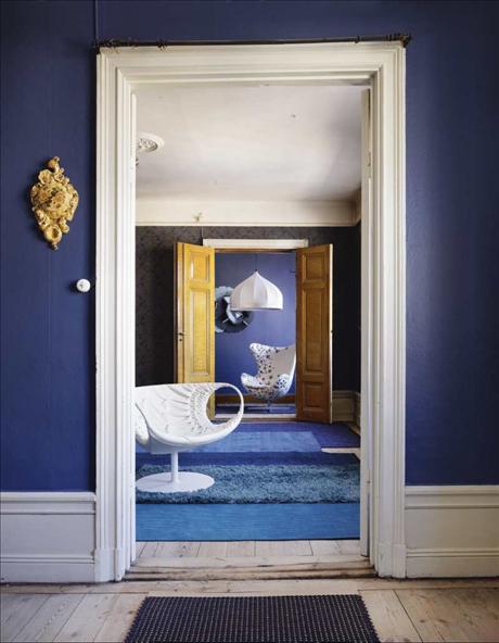 blue interior design with blue walls and rugs