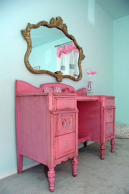 interior cabinet in aqua and pink