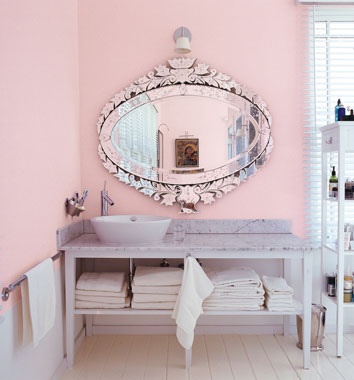 Bathroom in light pink and white.