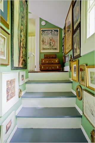 green stairway with art
