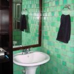 green cabo glass bathroom