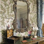 Louis XIV desk and an English Rococo mirror