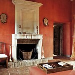 Red lounge room in Belvedere castle in Umbria Italy