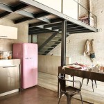 industrial loft kitchen with pink fridge