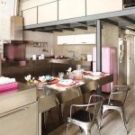 pink kitchen with steel appliances