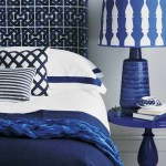navy blue bedroom with patterns